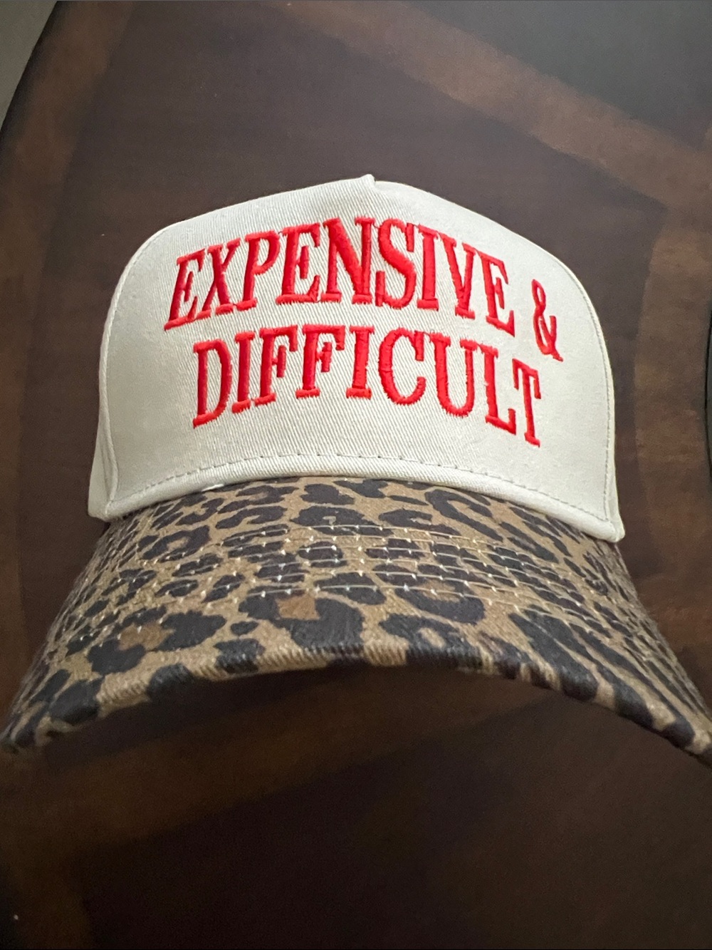 Beige Cap with Red Embroidery & Leopard Brim
